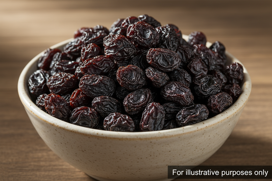 Create an image of Black raisins in a bowl, write 'For illustrative purposes only' in the image